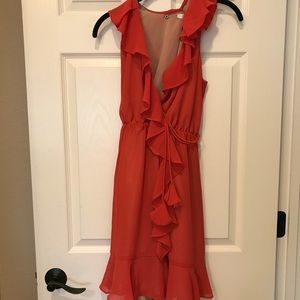 Gorgeous coral ruffled dress!